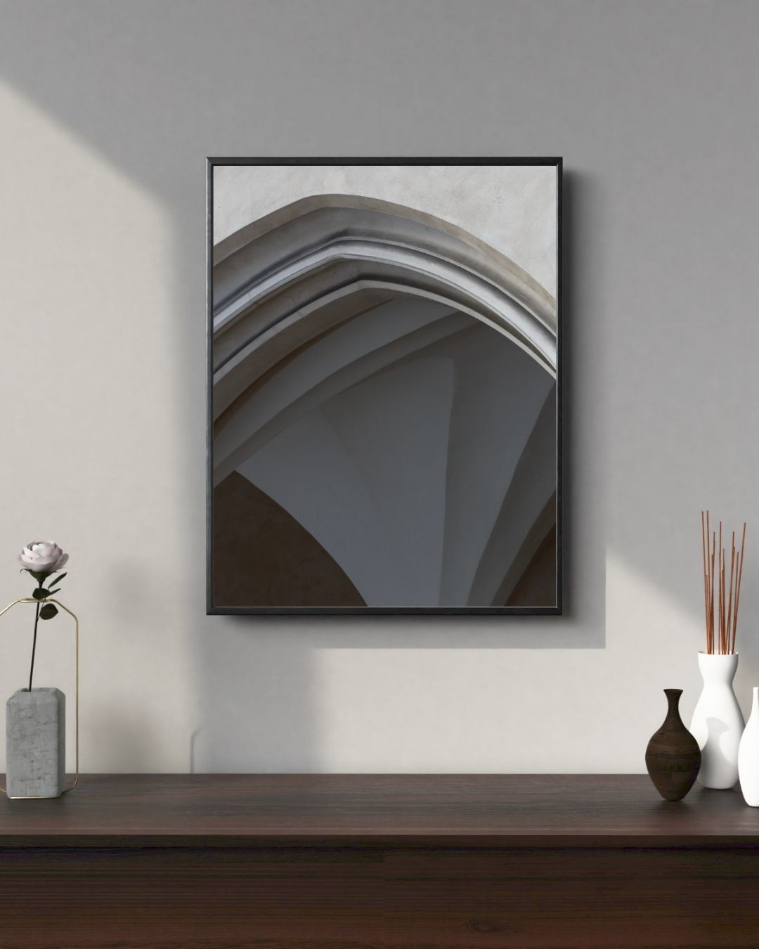 Photo of an archway framed above a desk 