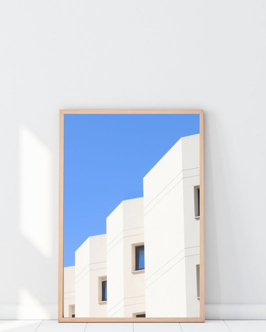 Minimal white buildings against the blue sky 